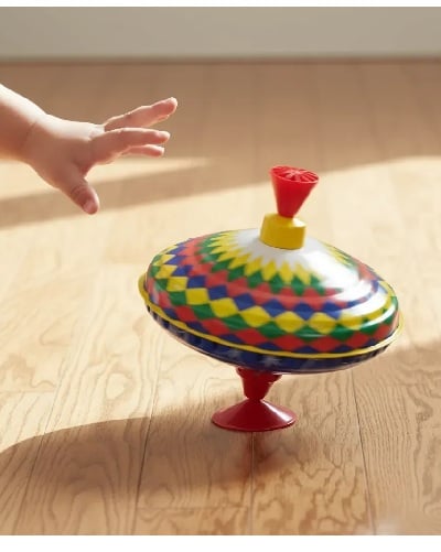 Trompo multicolor de 19 cm con cajita de regalo - Así se juega